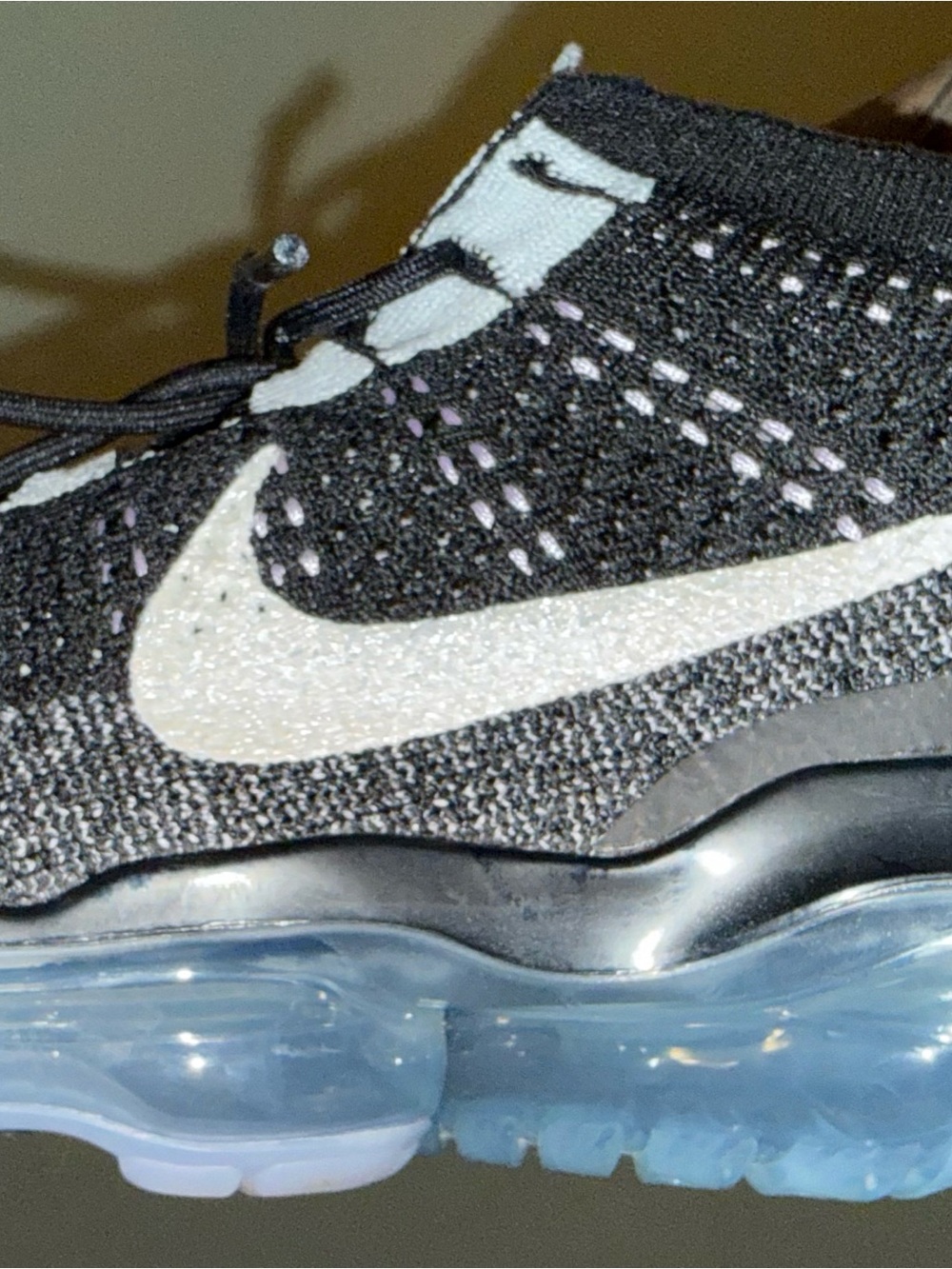 Nike Black Flyknit Sneaker with White Glitter Swoosh and Light Blue Air Sole